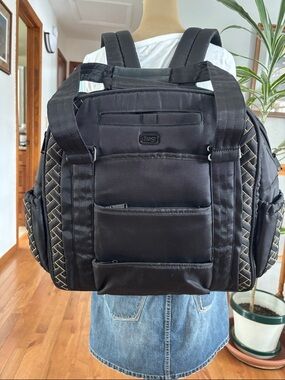 Lug Sprout travel bag/backpack. Black with yellow stitching. Like new.